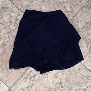 Black skirt in the front and shorts in the back